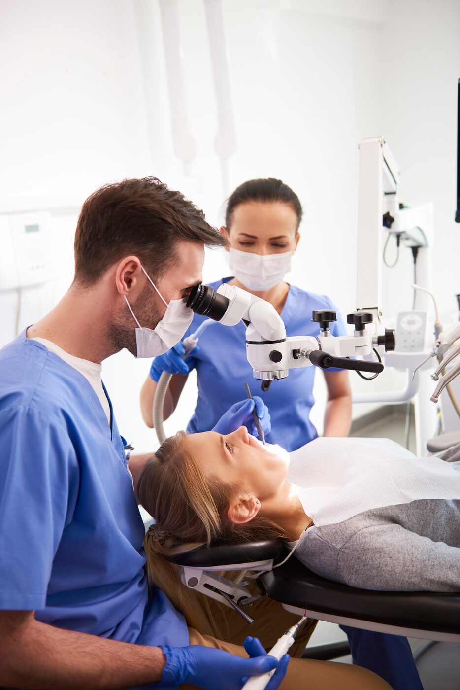 Dental team treating a patient